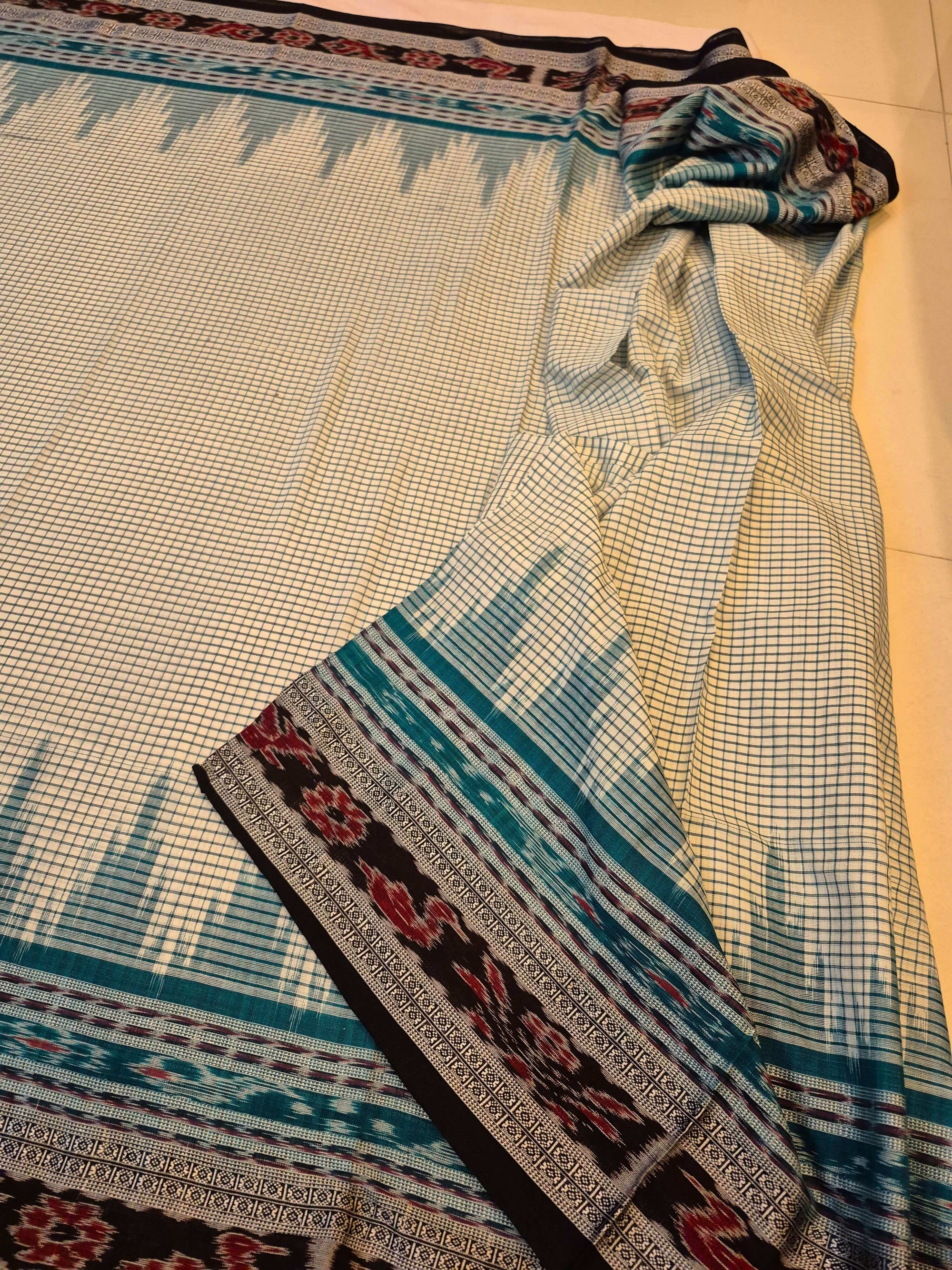 Off-white double order Sachipar Nuapatna Cotton Ikat saree with cotton ikat blouse piece
