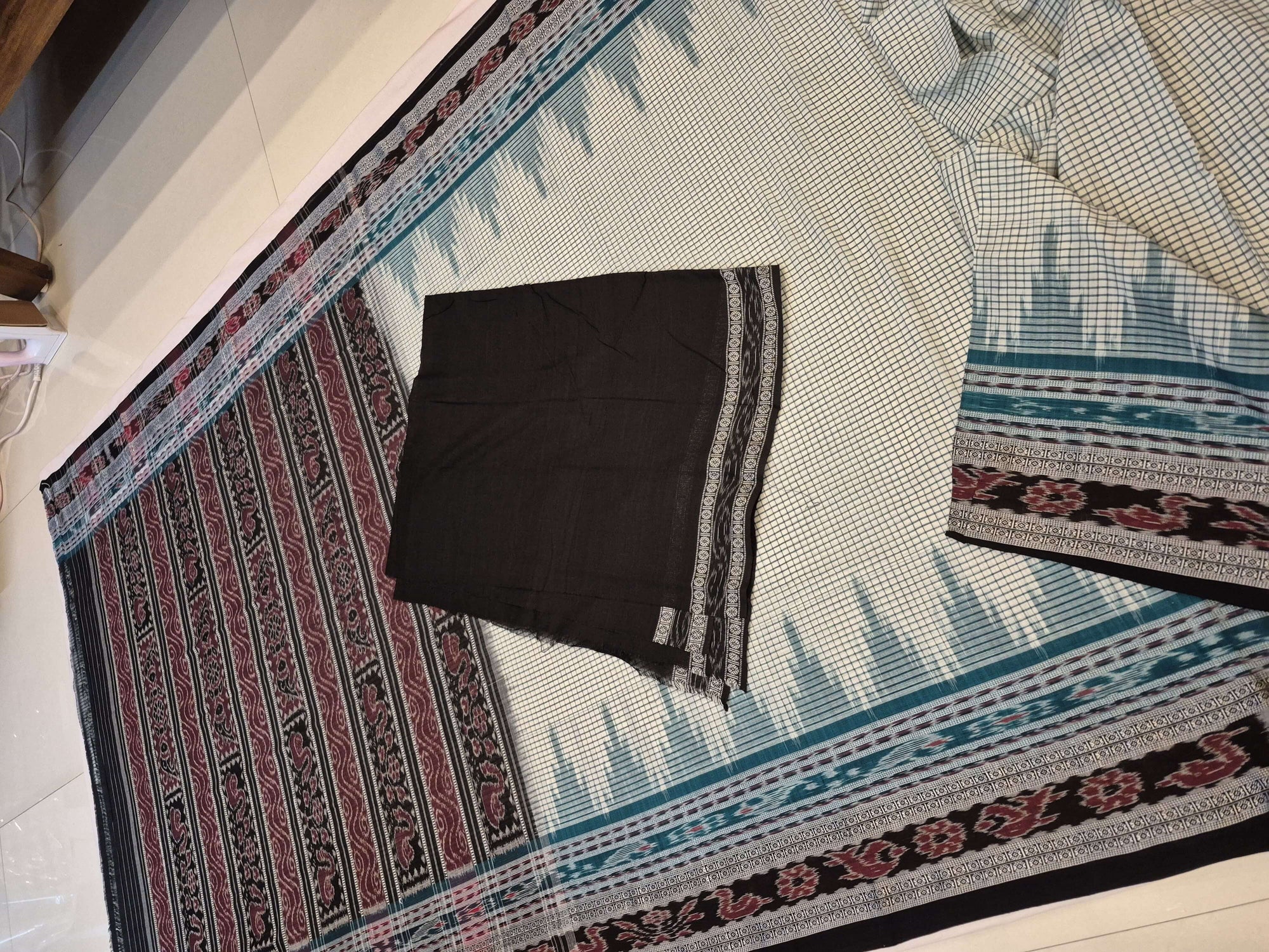 Off-white double order Sachipar Nuapatna Cotton Ikat saree with cotton ikat blouse piece