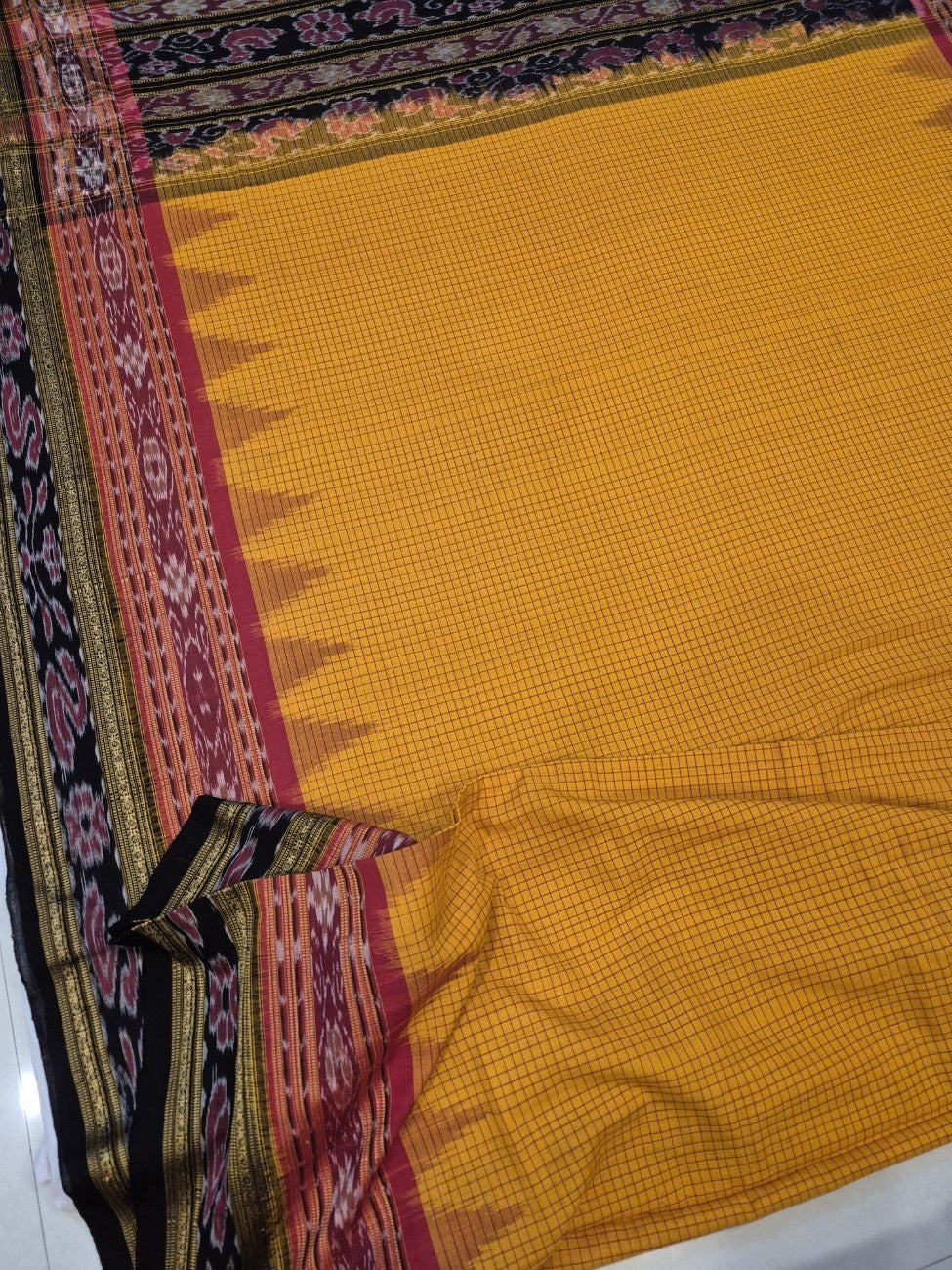 Yellow double order Sachipar Nuapatna Cotton Ikat saree with cotton ikat blouse piece