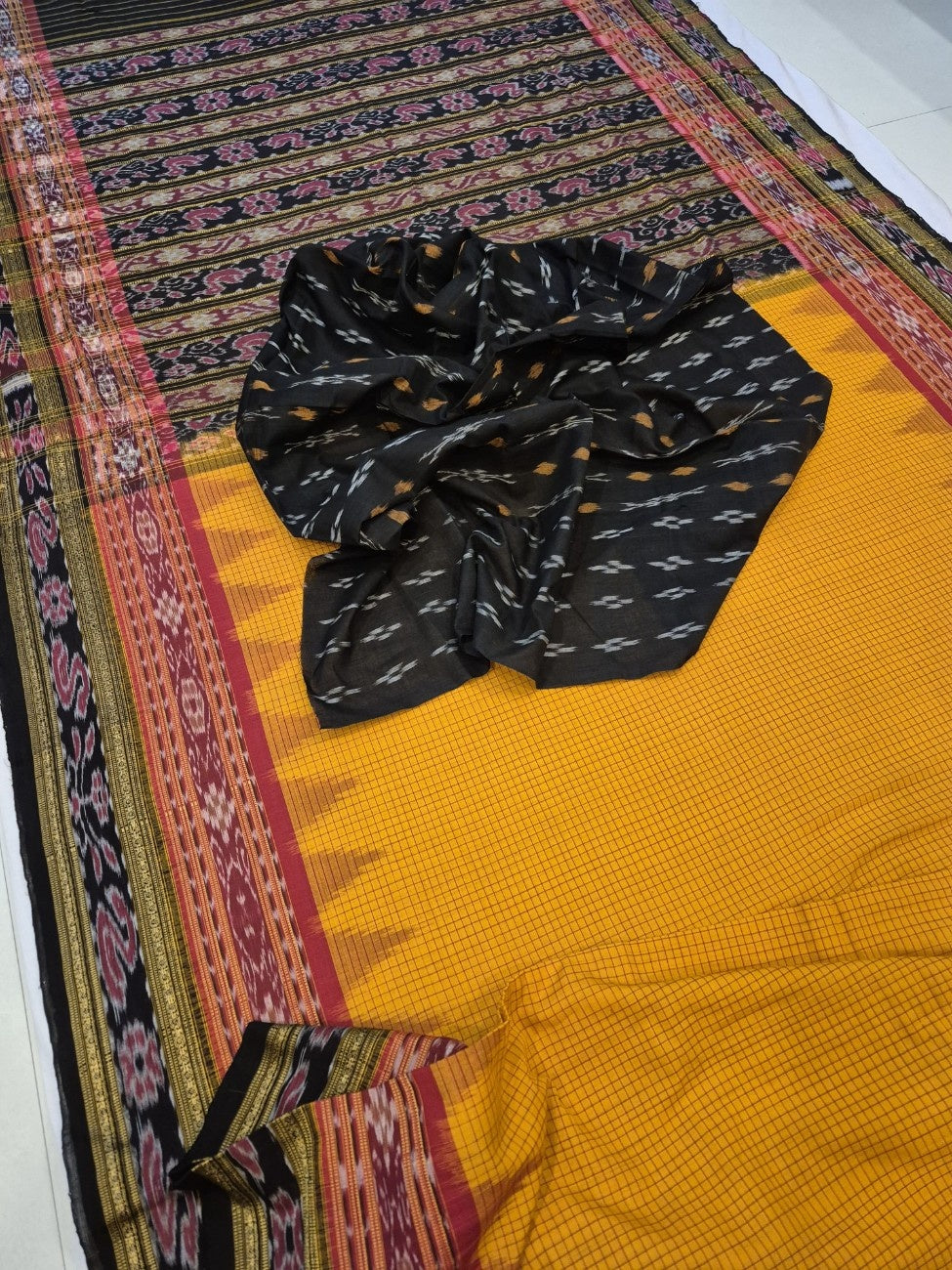 Yellow double order Sachipar Nuapatna Cotton Ikat saree with cotton ikat blouse piece