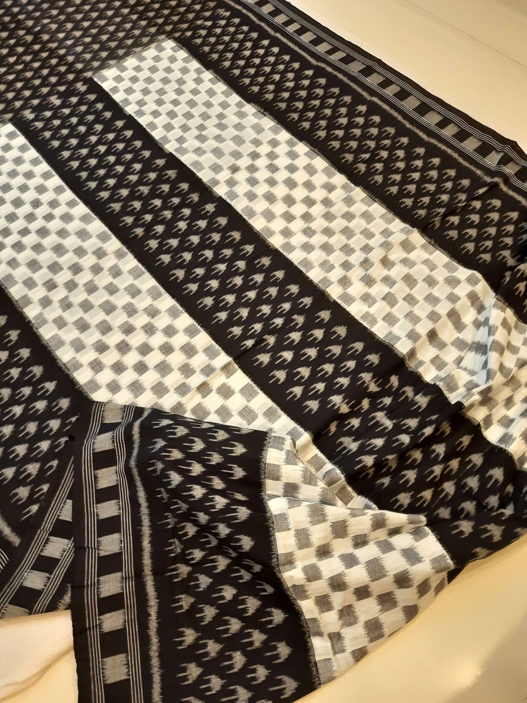 White and Black Cotton Ikat saree with cotton ikat blouse piece