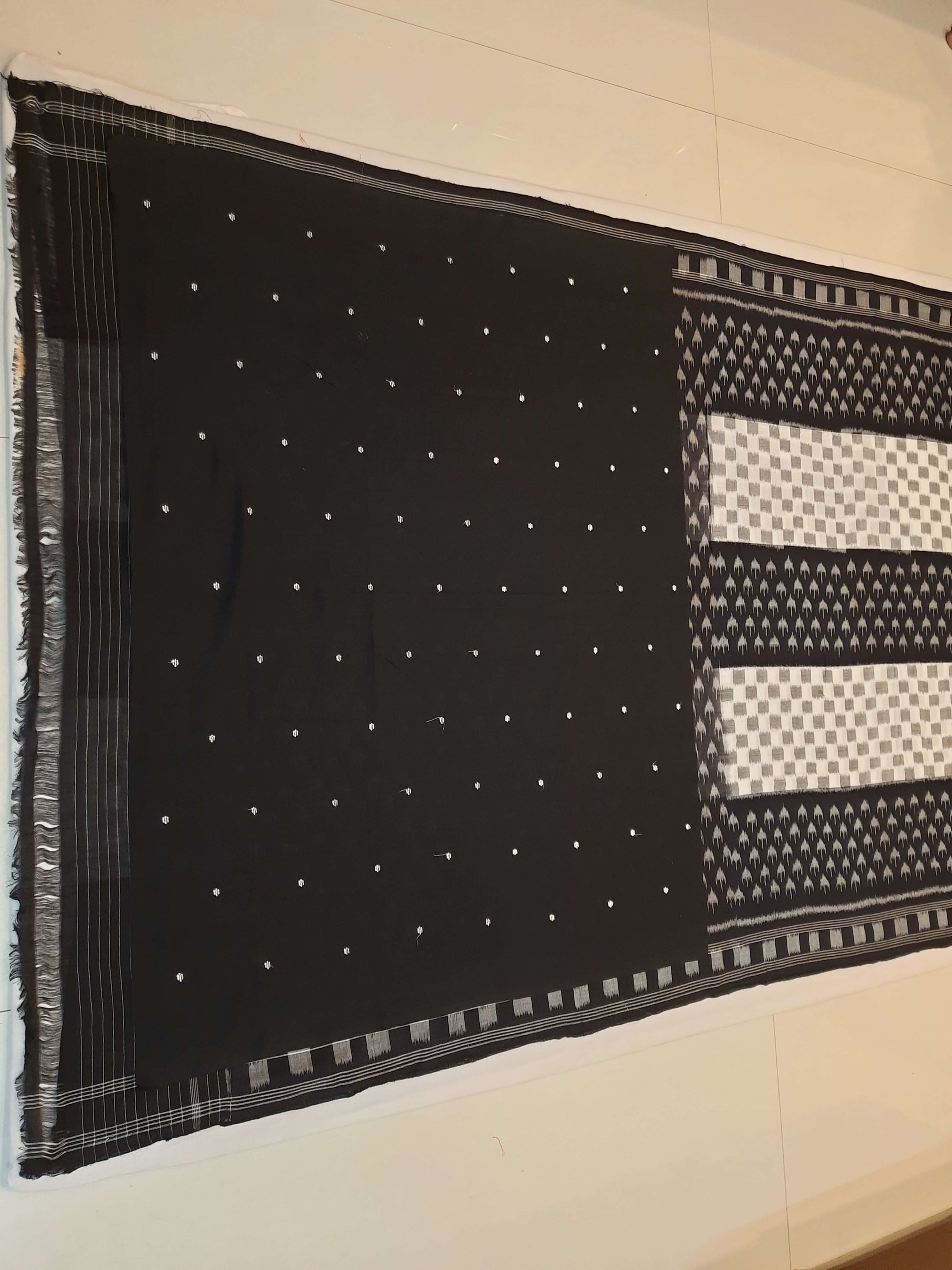 White and Black Cotton Ikat saree with cotton ikat blouse piece