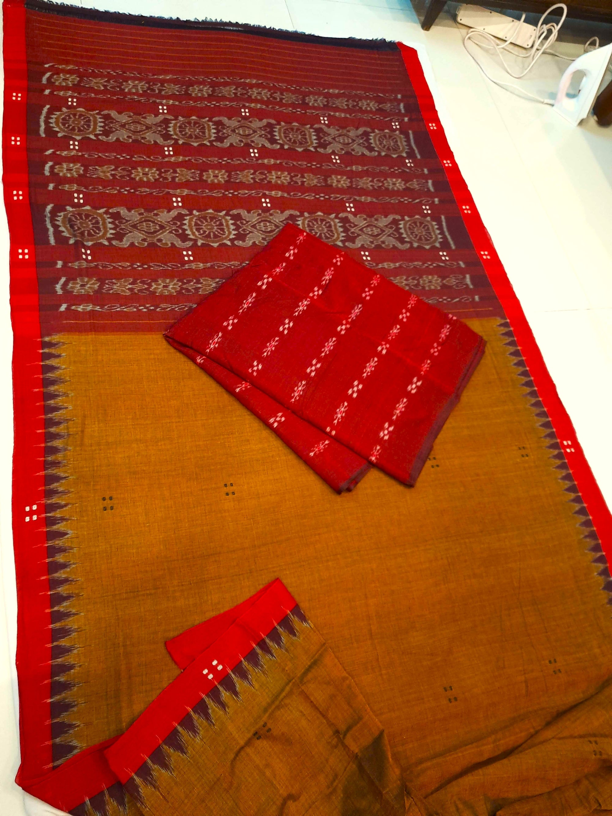 Mustard Brown Cotton Odisha Ikat saree paired with cotton ikat blouse piece