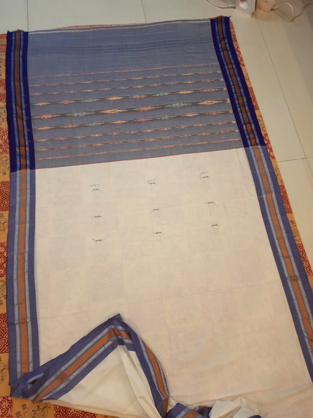 White Cotton Odisha Ikat saree with mix match blouse piece