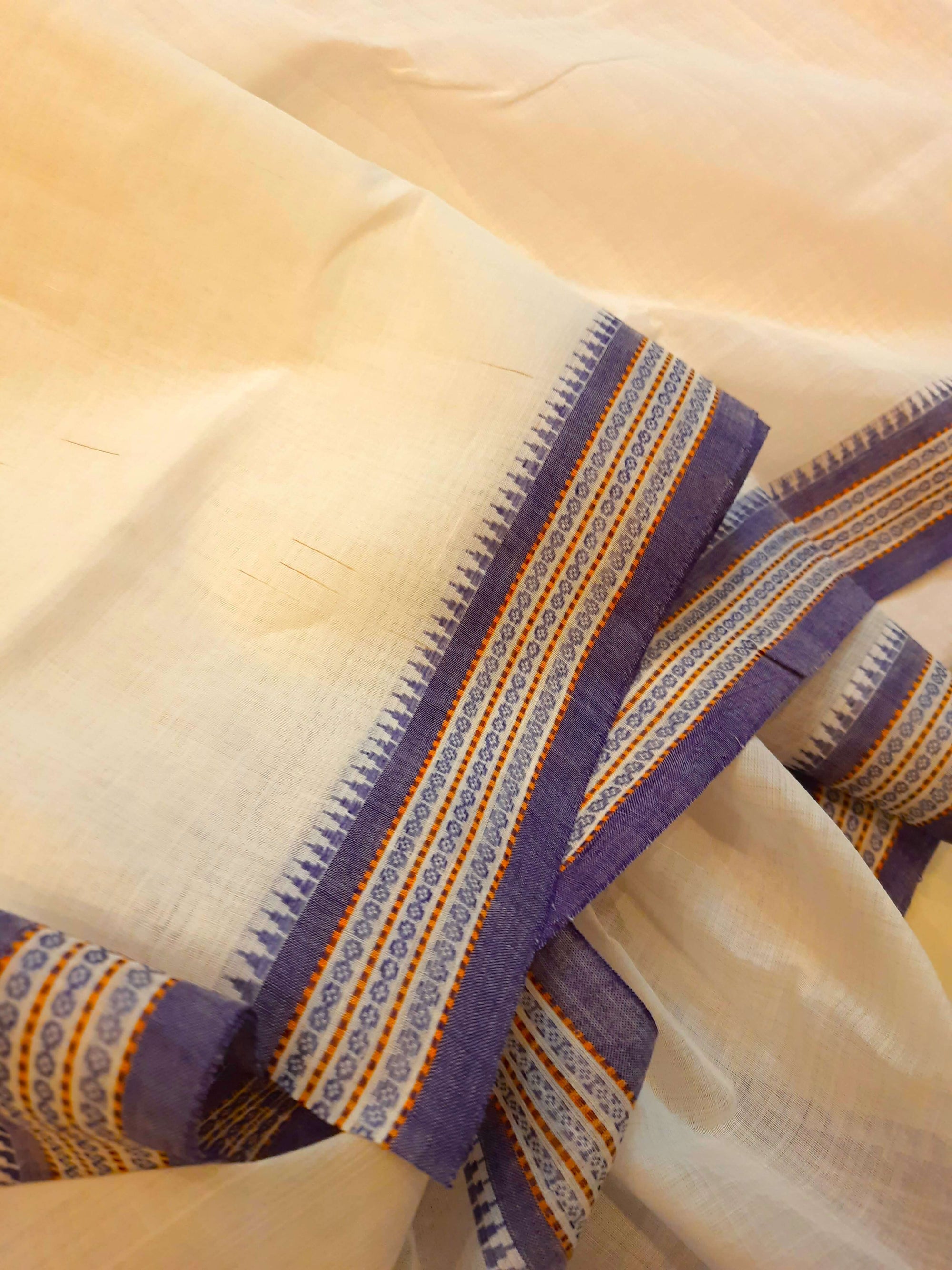 White Cotton Odisha Ikat saree  with mix match cotton ikat blouse