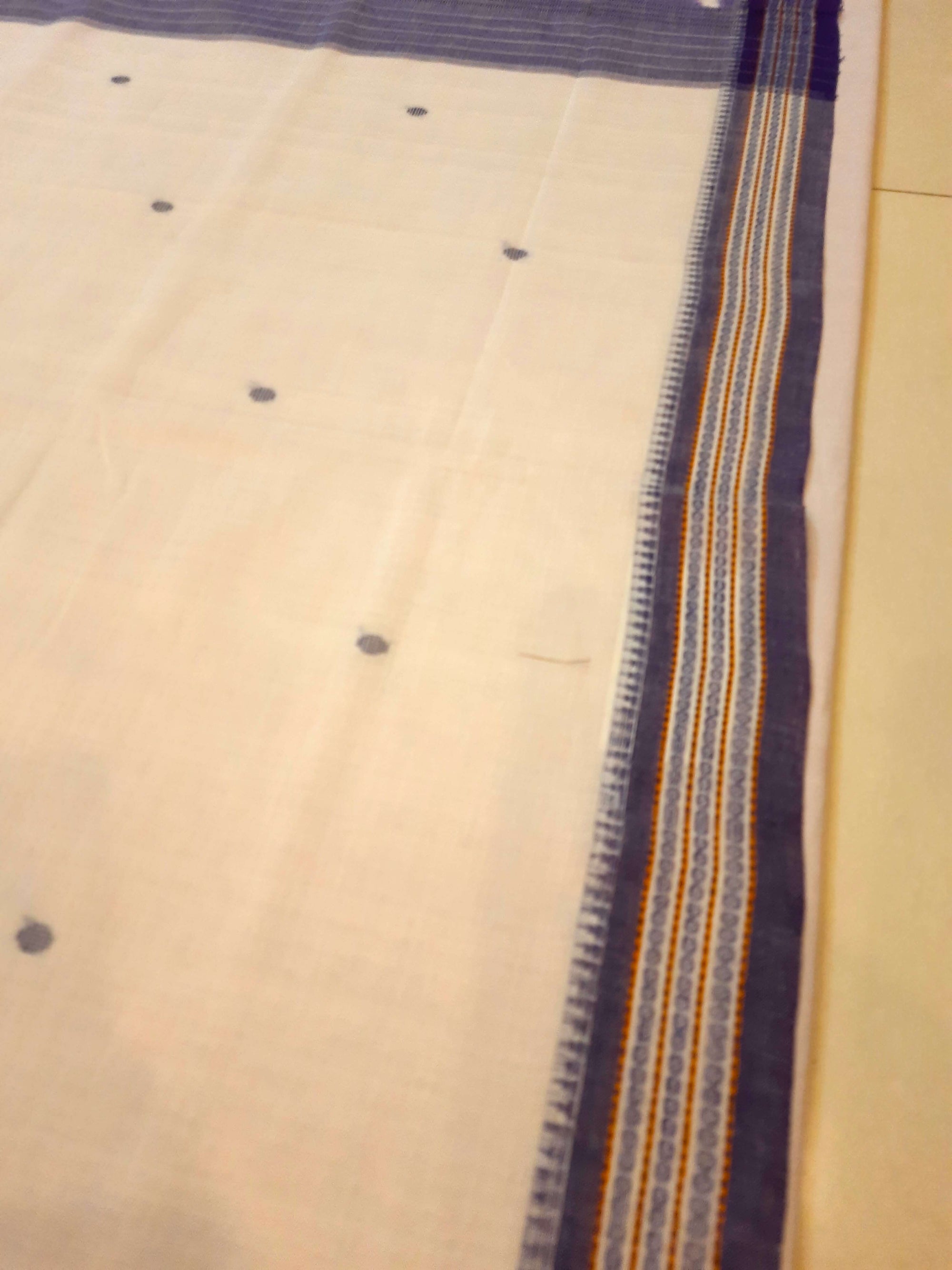 White Cotton Odisha Ikat saree  with mix match cotton ikat blouse