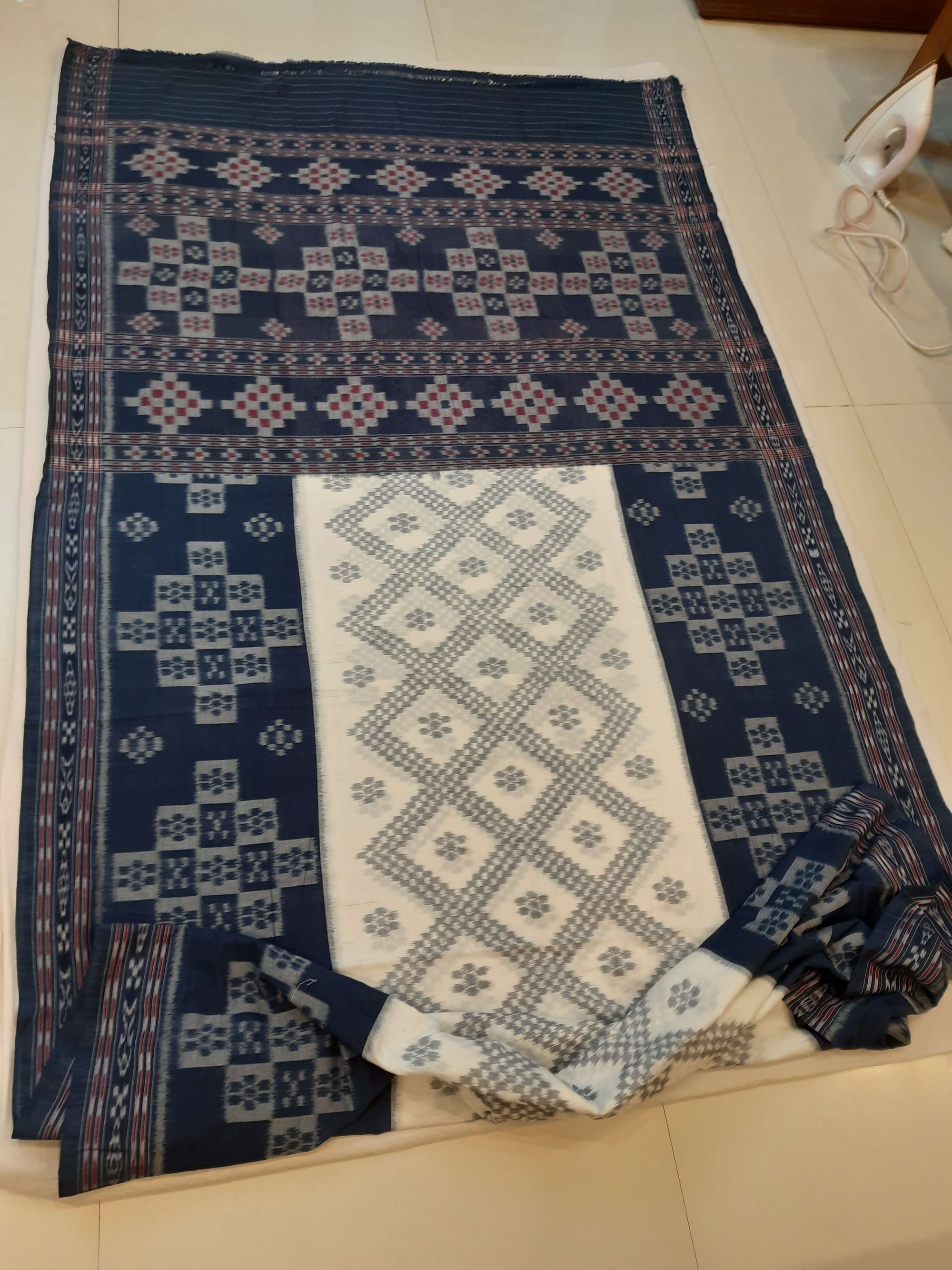 White and Blue wide border Cotton Odisha Ikat saree with mix match blouse piece
