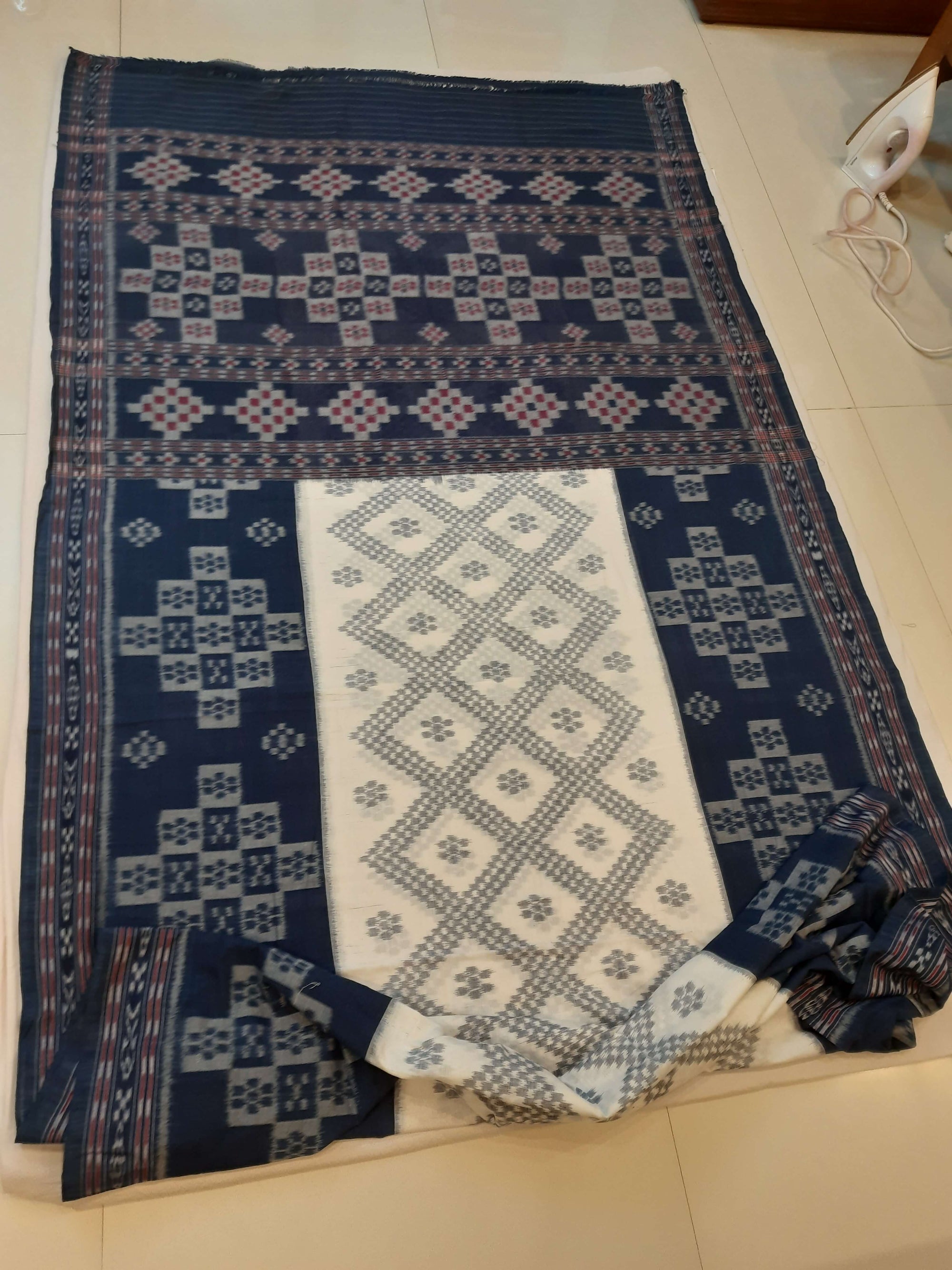 White and Blue wide border Cotton Odisha Ikat saree with mix match blouse piece
