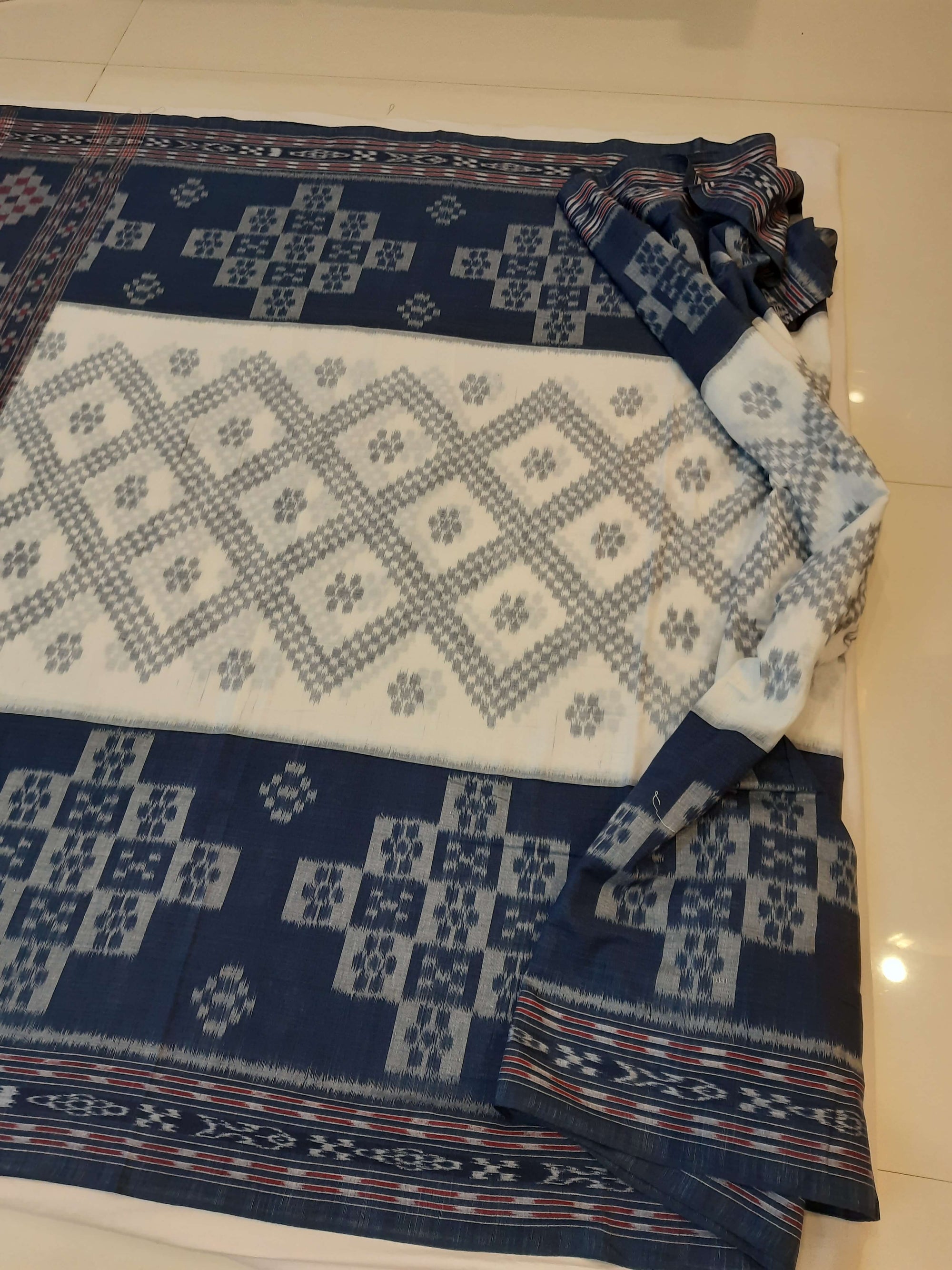White and Blue wide border Cotton Odisha Ikat saree with mix match blouse piece