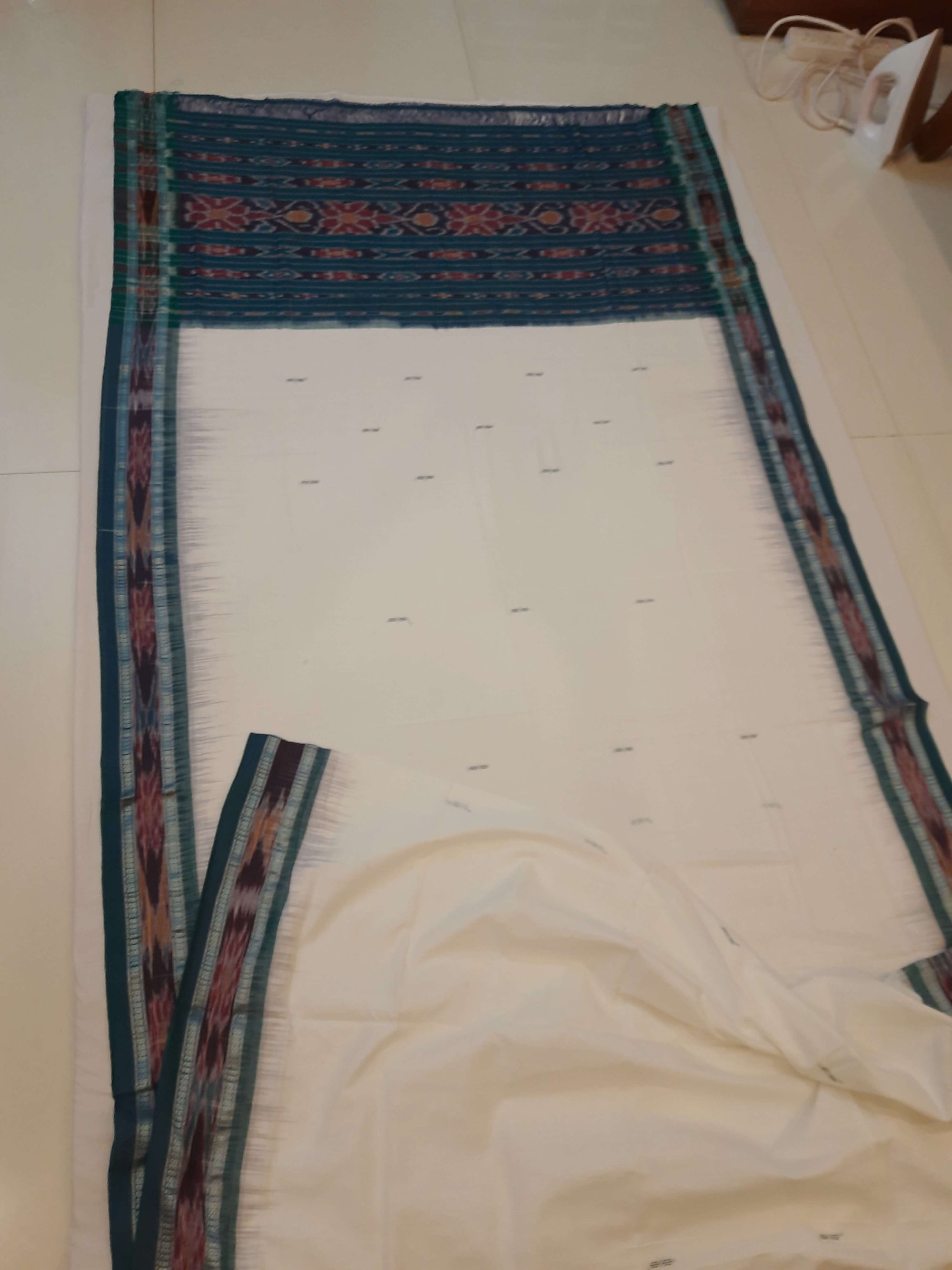 White Cotton Odisha Ikat saree with mix match blouse piece