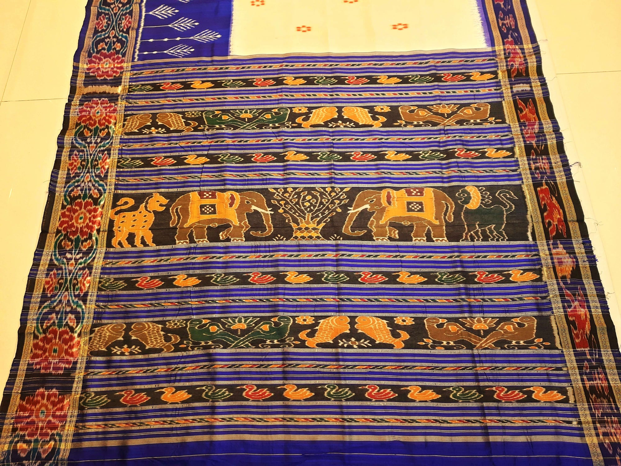 White wide border Odisha Khandua Pata Silk Saree with cotton ikat blouse piece