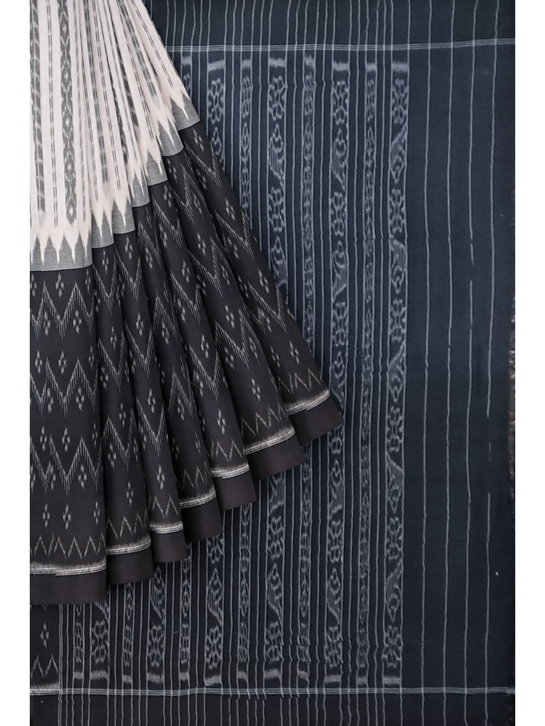 Black and White Cotton Odisha Ikat saree with matching cotton ikat blouse piece