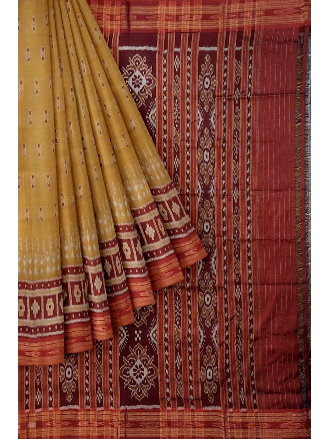 Golden wide border Odisha Khandua Pata Silk Saree paired with cotton ikat blouse piece