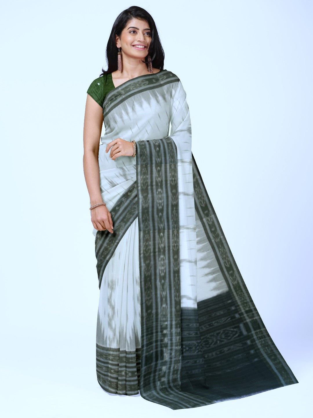 White wide border Cotton Odisha Ikat saree with mix match cotton ikat blouse