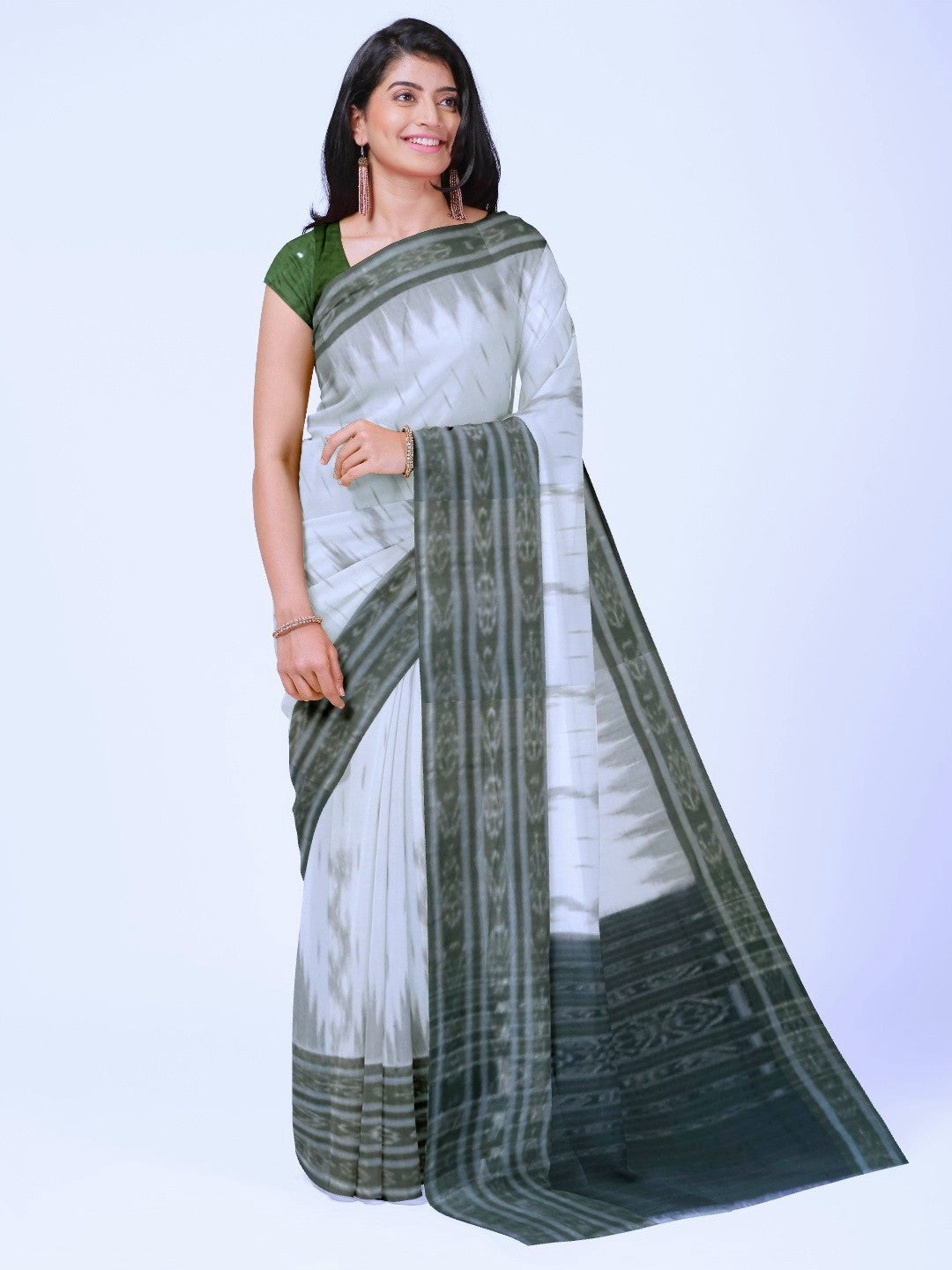 White wide border Cotton Odisha Ikat saree with mix match cotton ikat blouse