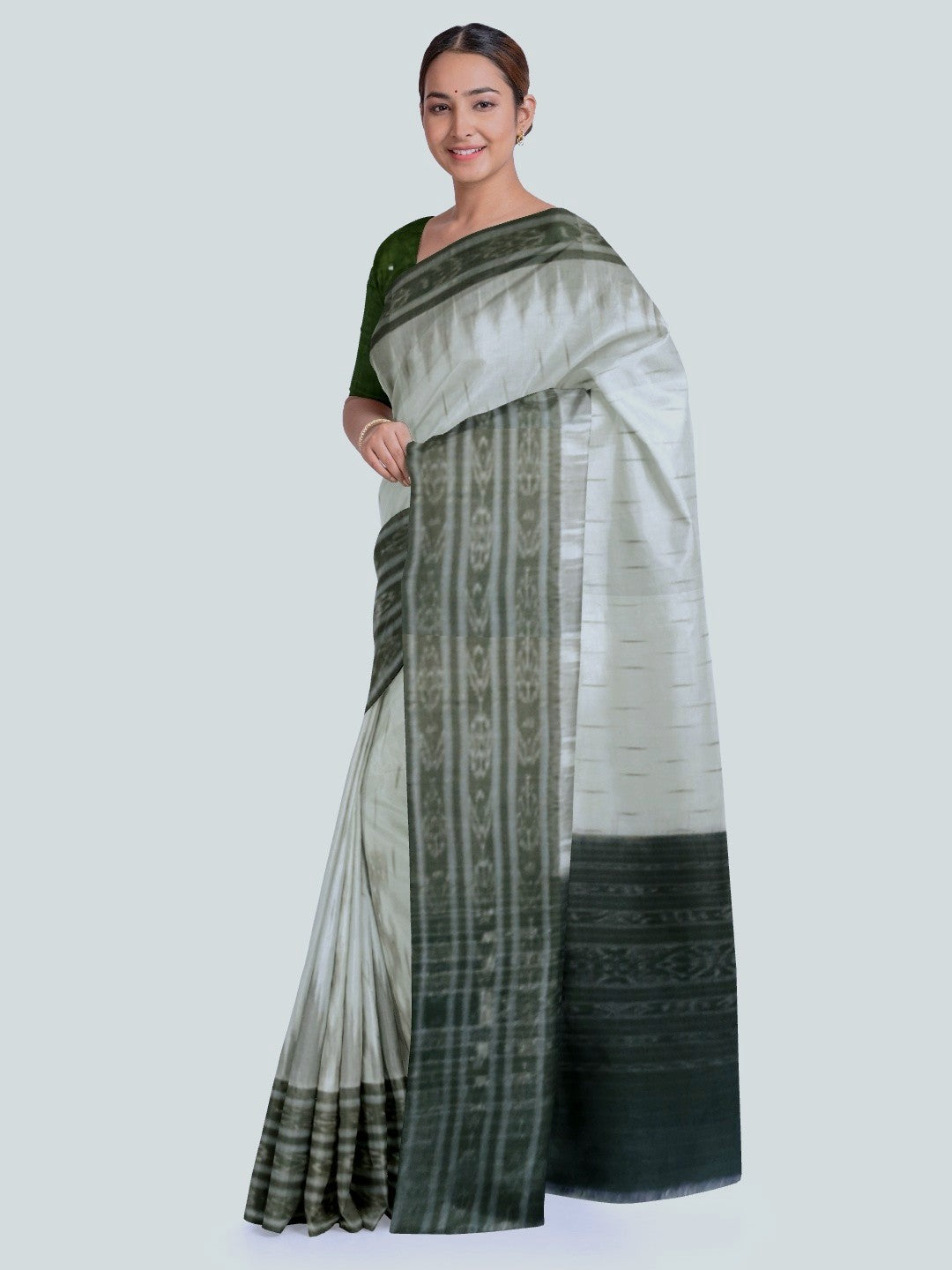 White wide border Cotton Odisha Ikat saree with mix match cotton ikat blouse