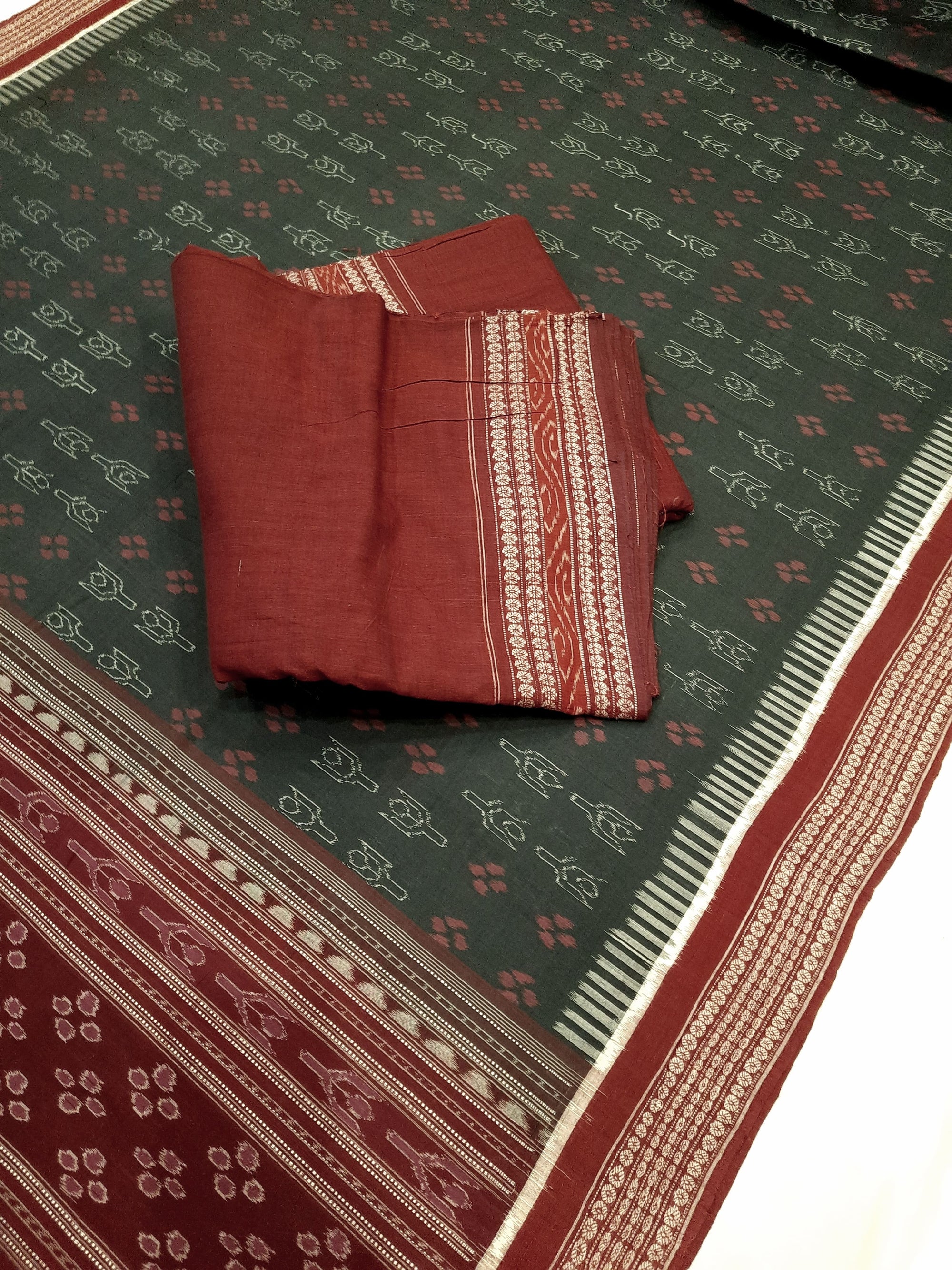 Grey kathiphera Sambalpuri Ikat Saree with contrast cotton ikat blouse piece