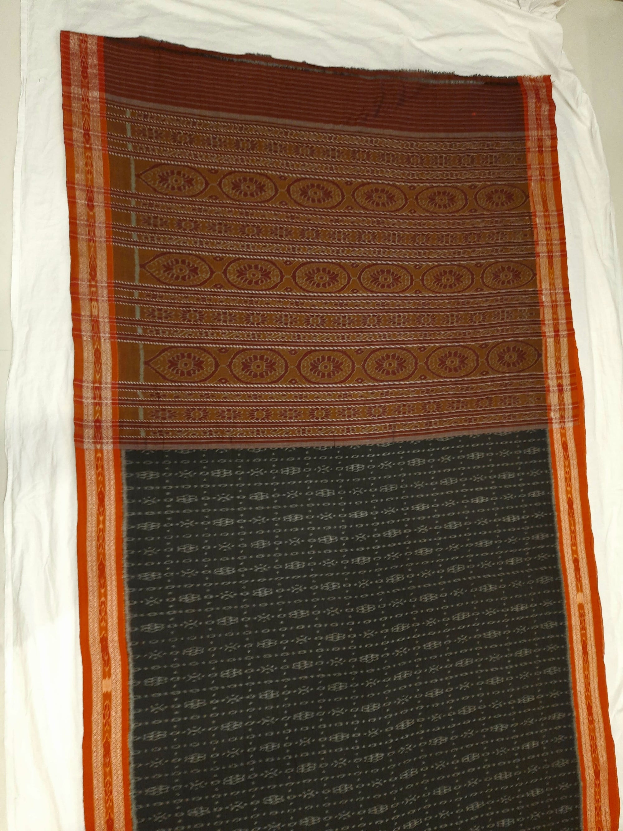 Black Cotton Sambalpuri Ikat Saree with matching blouse piece