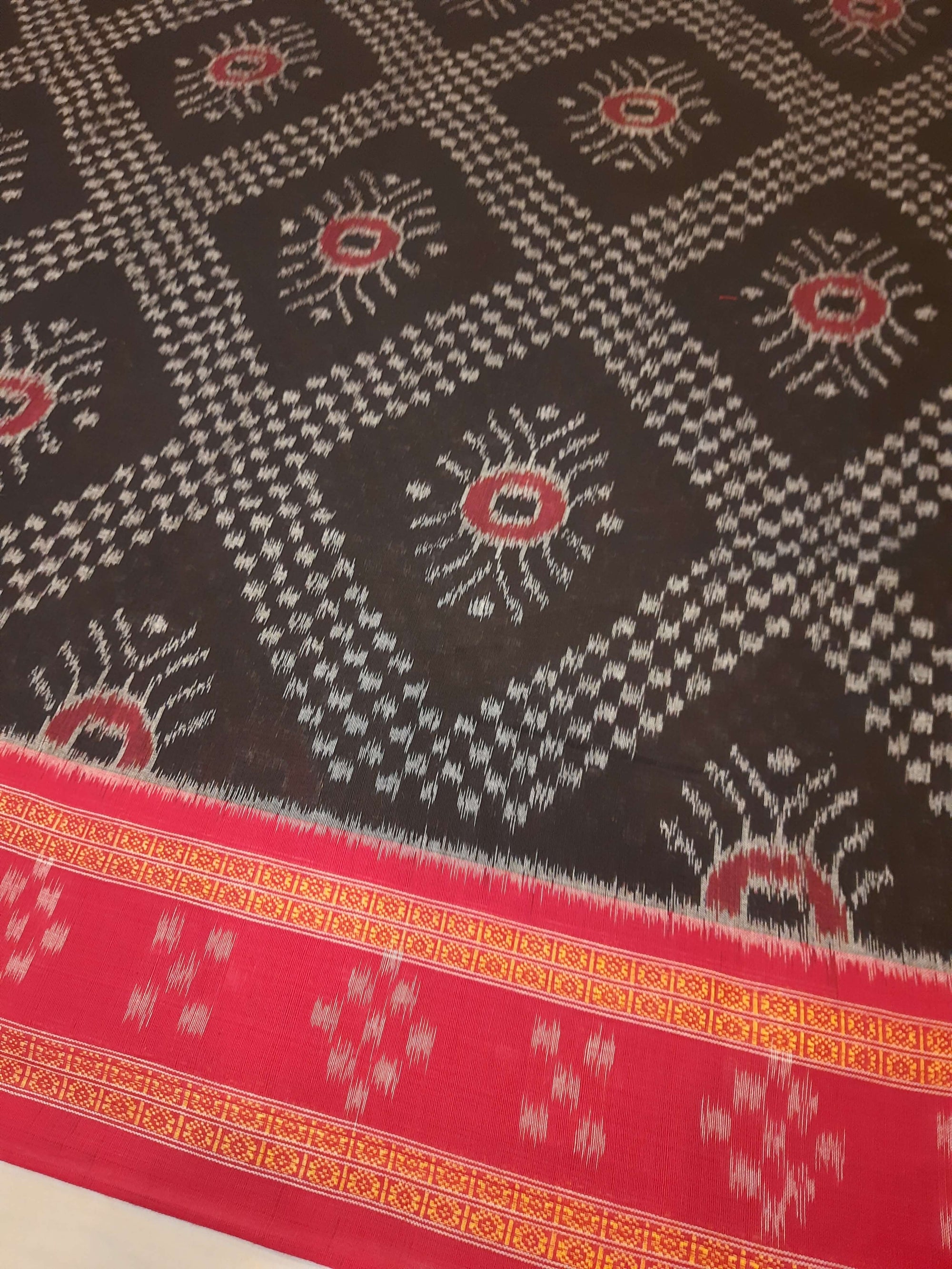 Black and red cotton Odisha ikat saree with Tarabali pattern and matching blouse piece