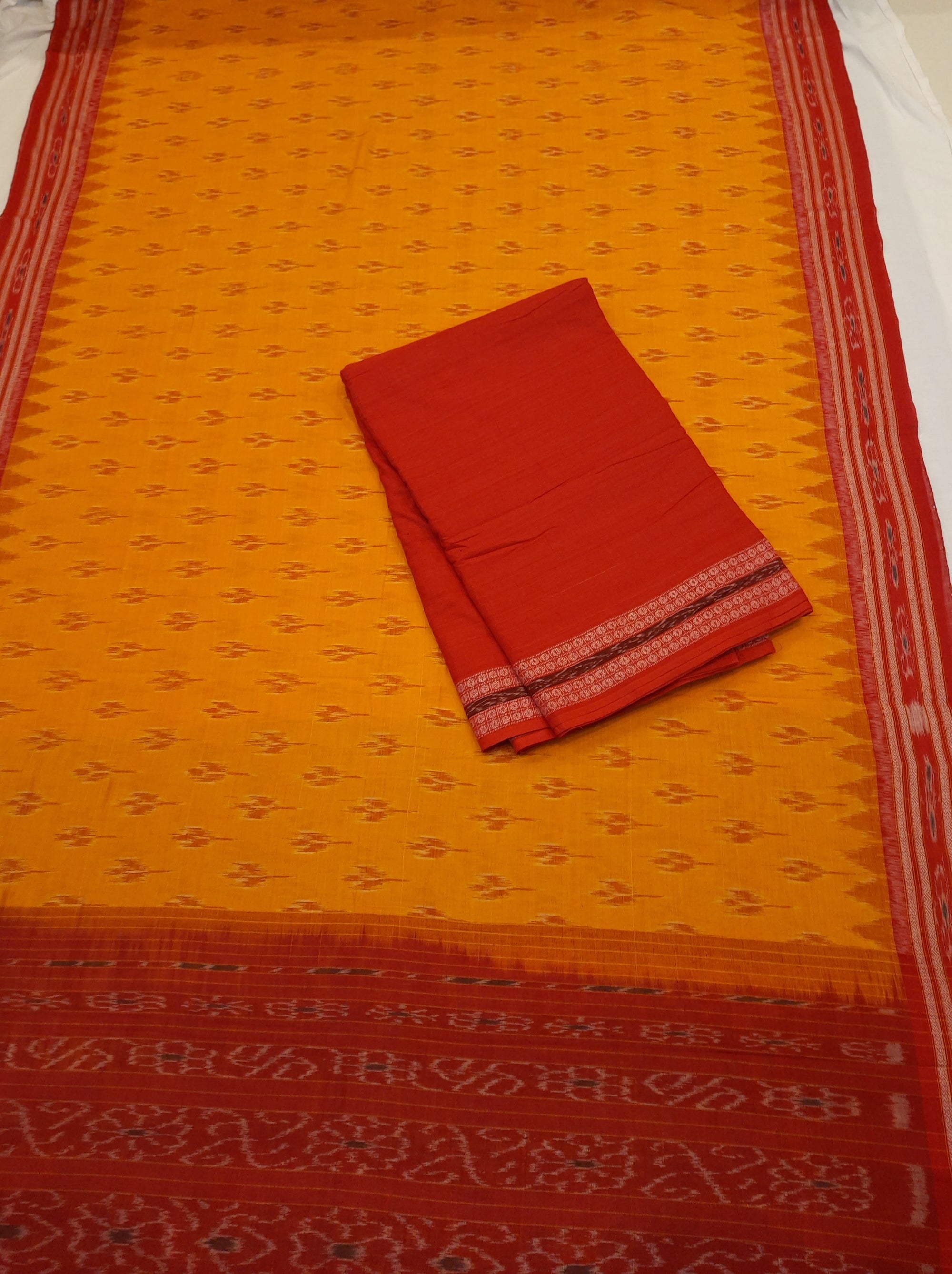 Yellow Cotton Odisha Ikat saree with sambalpuri ikat blouse piece